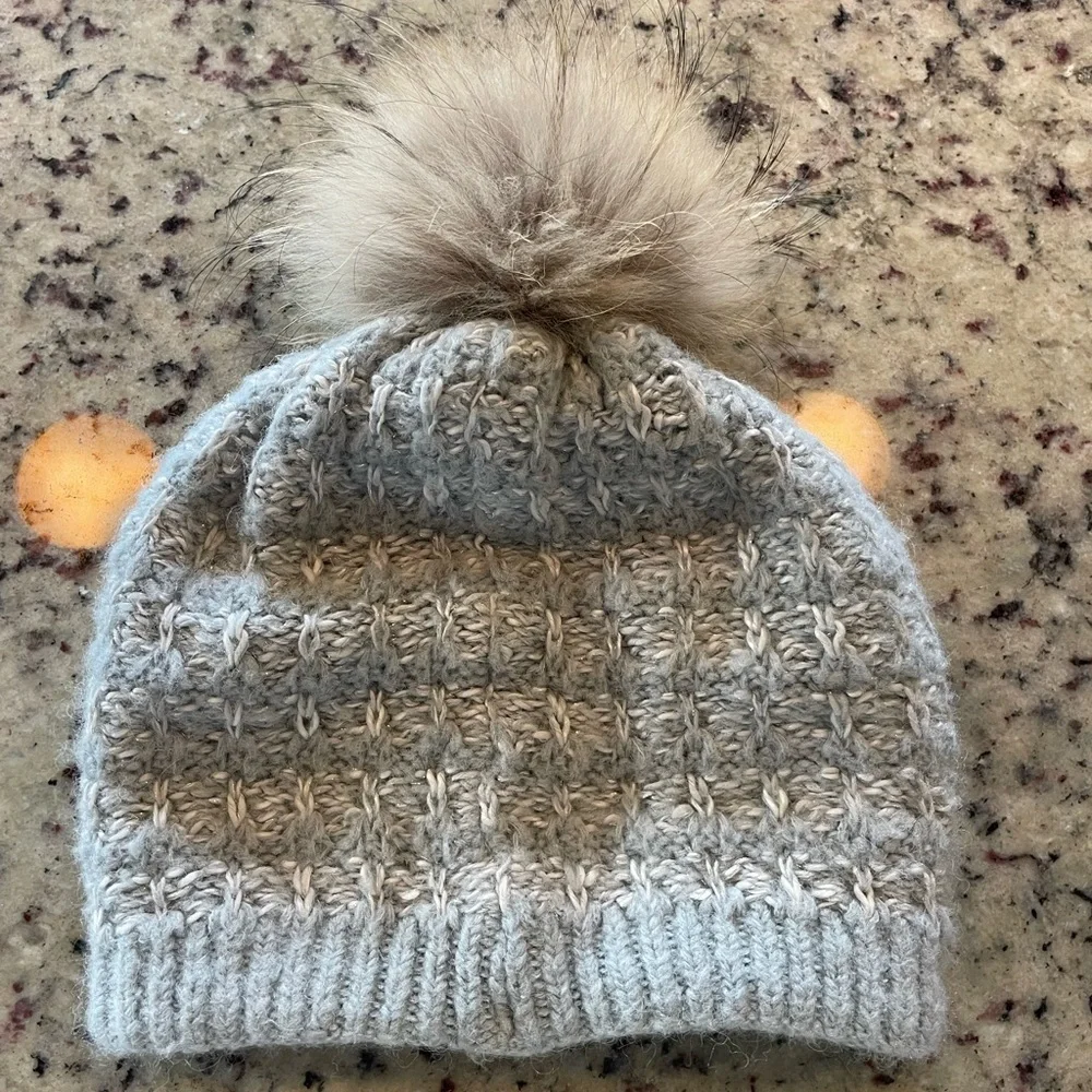 Descente Light Gray Knit Beanie with genuine raccoon Pom-Pom